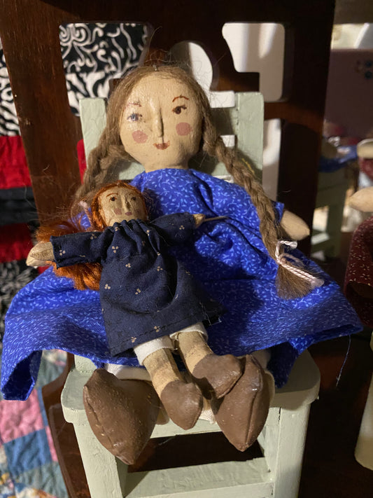 Dolls with chair